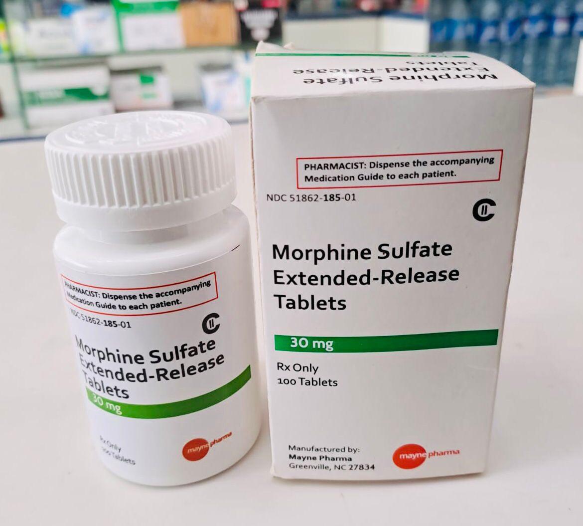 Morphine-Sulfate-Tablets-Canada-Delivery Authentic morphine sulfate oral tablets in secure pharmaceutical blister packaging on a white surface.
