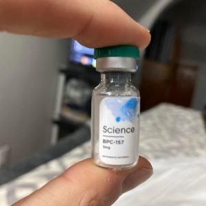 A single clear glass vial labeled BPC-157 on a clean blue gradient background