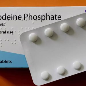 Authentic codeine phosphate tablets in secure pharmacy packaging on a clean surface.