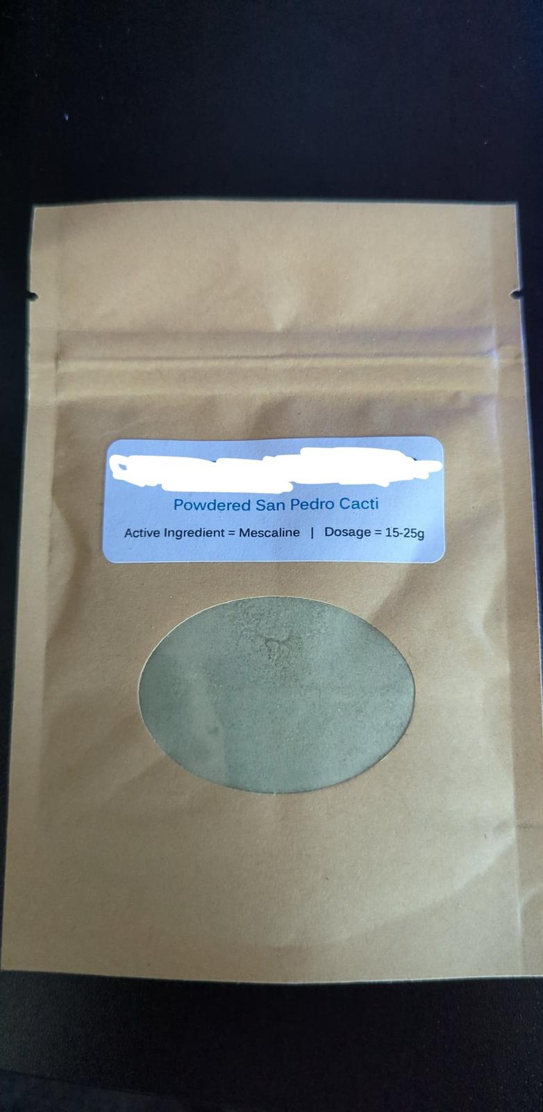 Finely ground organic San Pedro cactus powder piled neatly on a white surface buy-mescaline-cactus-canada-san-pedro-online